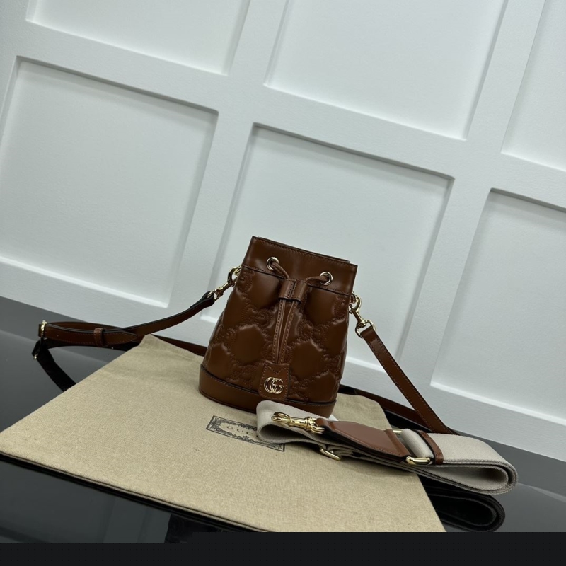 G*u*i bucket bags